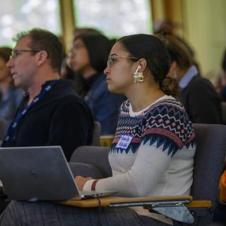 Student listening to a talk at the MacMillan Center